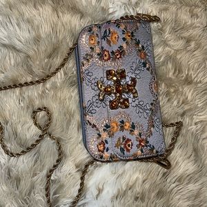 Beautiful Tori Burch bag! Has the most gorgeous mix of colors over jean lining!